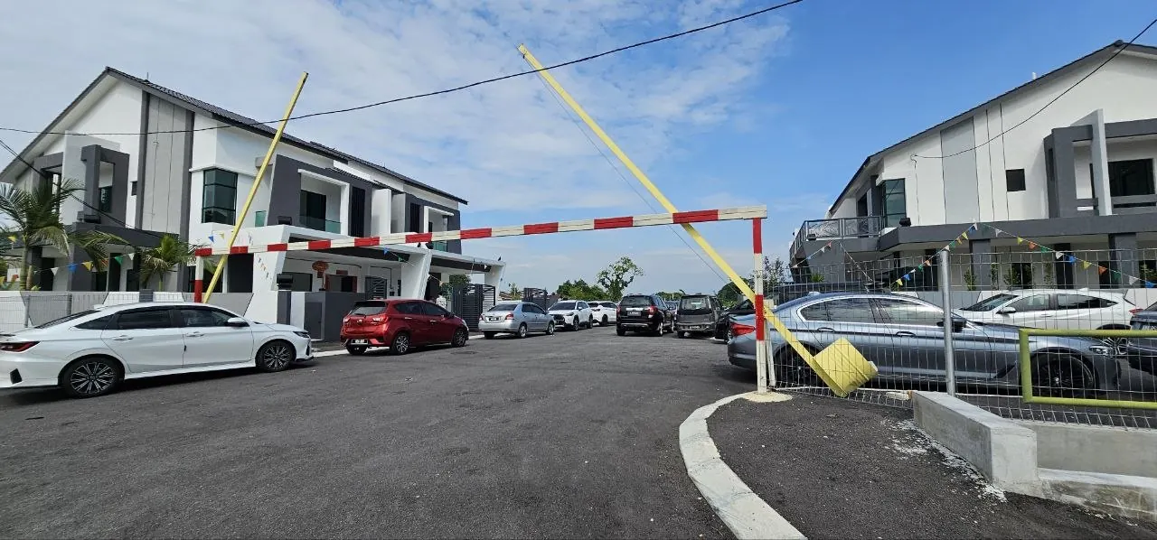 Boom gate at the entrance to Ampang Cove