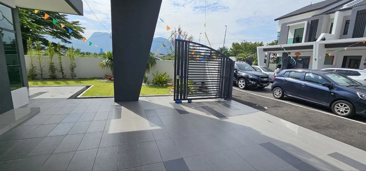 Car porch and sliding gate at an Ampang Cove terrace unit