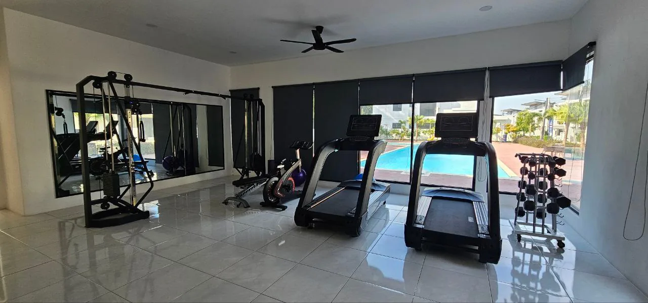 Diamond Pavilion gym room with treadmills overlooking the pool