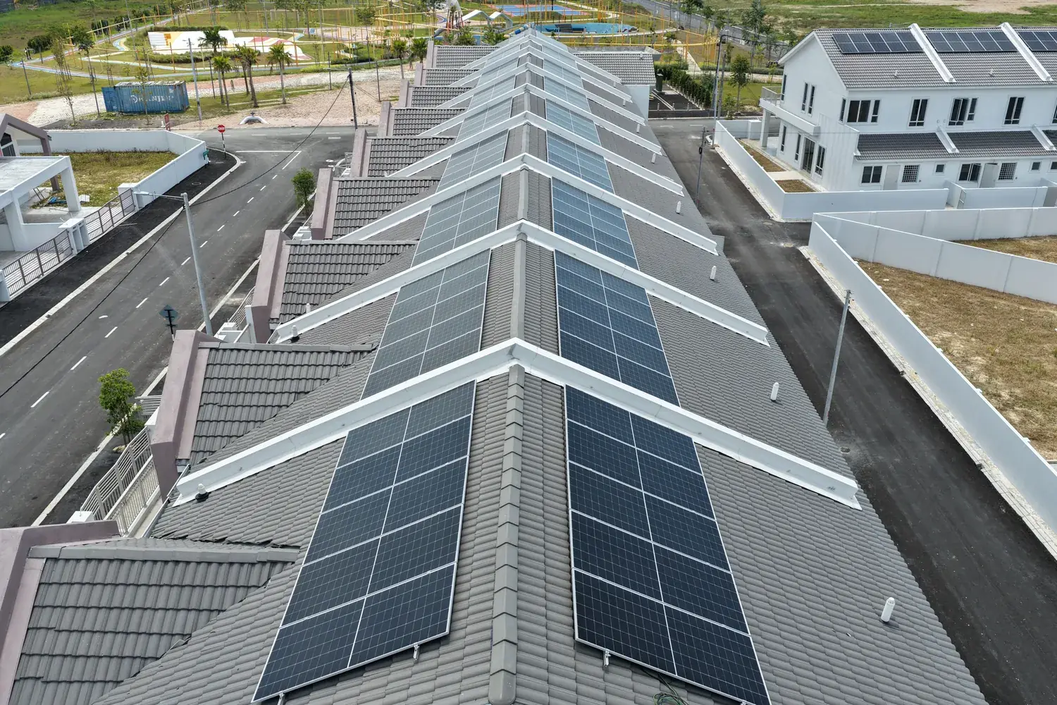 Solar panels installed on the roofs of completed terrace homes at Klemeru, Meru Ipoh